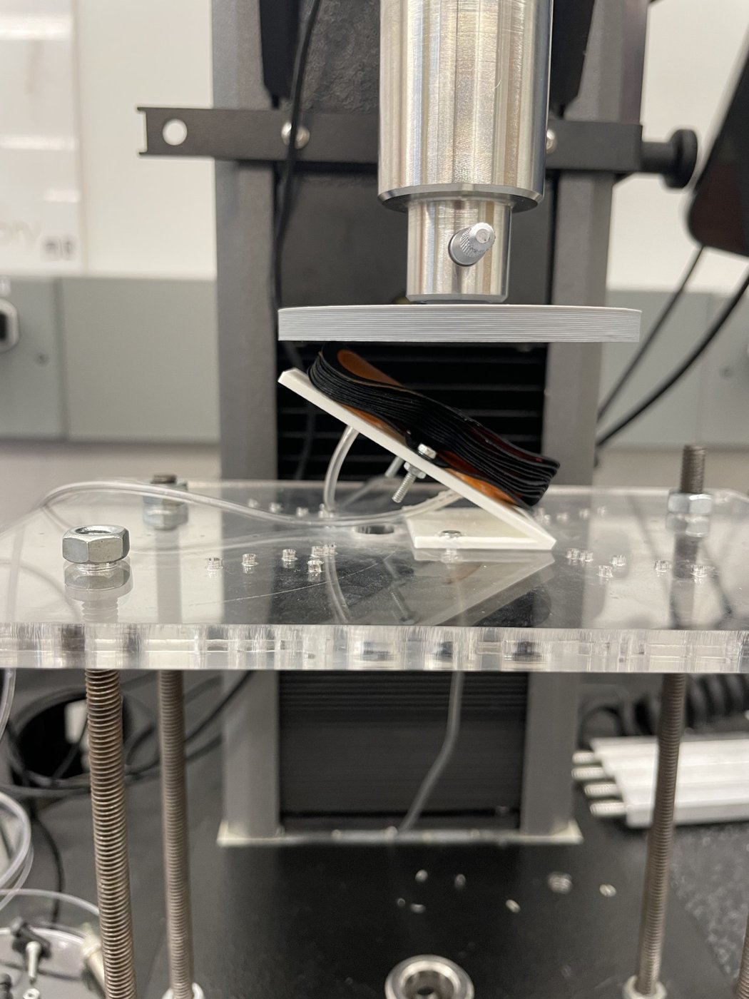 Stacked balloon actuator test fixture